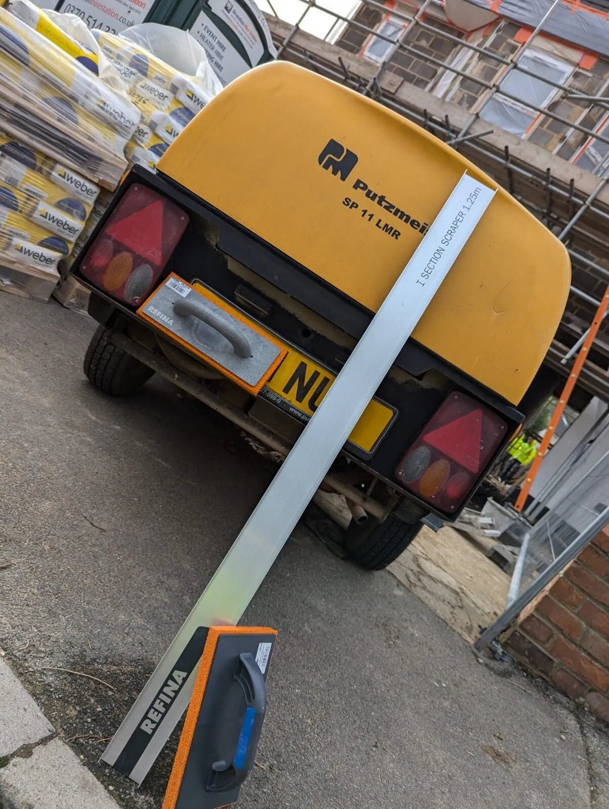 Adept’s Putzmeister spray render machine on site